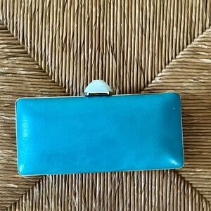 Trina Turk Collection for Banana Republic,  leather clutch with gold chain .